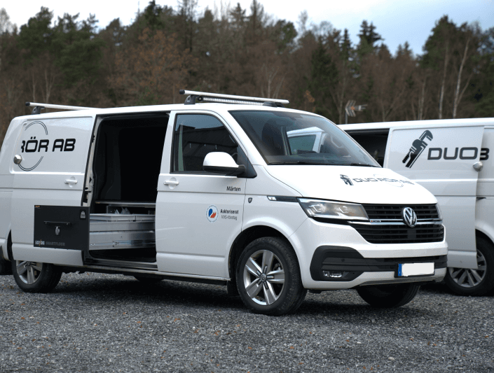 Professional plumber working on copper pipes